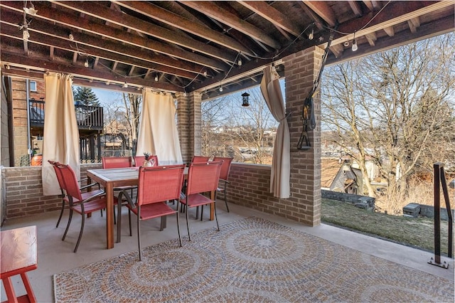 view of patio featuring outdoor dining area