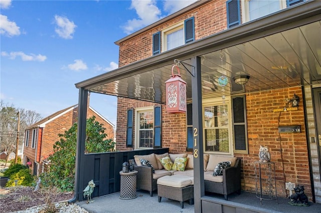 view of patio / terrace featuring covered porch and outdoor lounge area