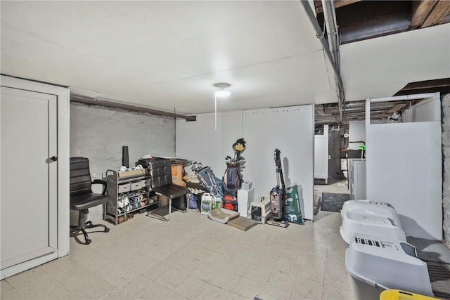 finished basement featuring tile patterned floors