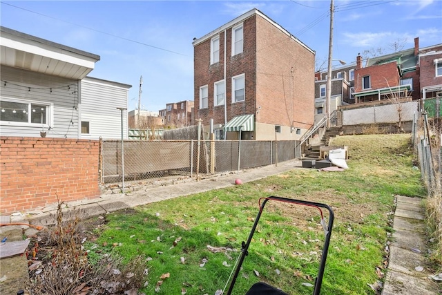 view of yard with a fenced backyard