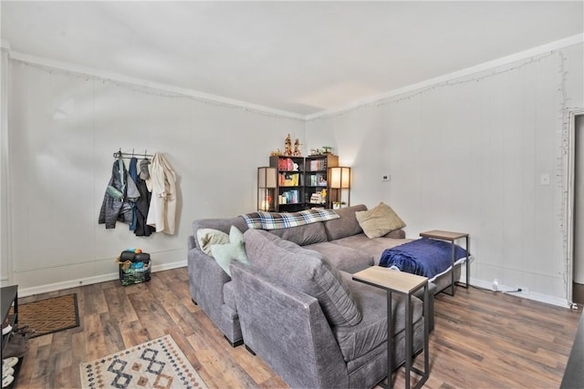 living room with baseboards and wood finished floors