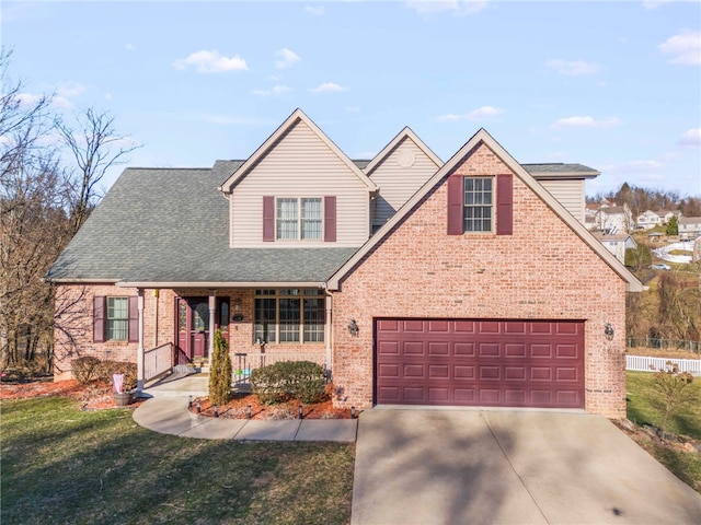 traditional home with a front lawn, driveway, a porch, roof with shingles, and brick siding