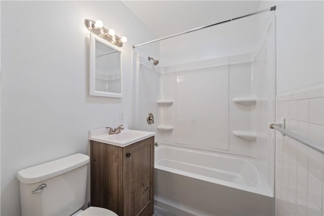 bathroom featuring vanity, toilet, and shower / bathtub combination