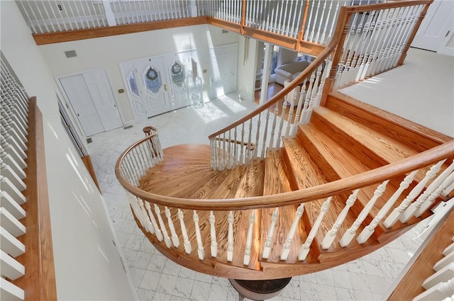 5125 Bear Run Rd, Cranberry Twp, PA 16066 - staircase with marble finish flooring and a towering ceiling