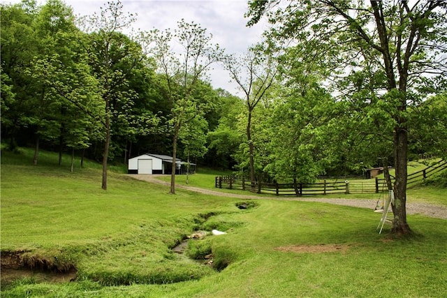 5125 Bear Run Rd, Cranberry Twp, PA 16066 - view of yard featuring an outdoor structure and a detached garage