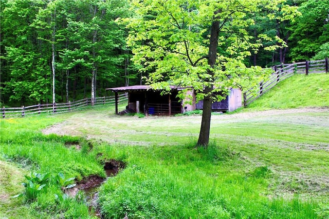 5125 Bear Run Rd, Cranberry Twp, PA 16066 - view of yard with a forest view, an outbuilding, and a pole building
