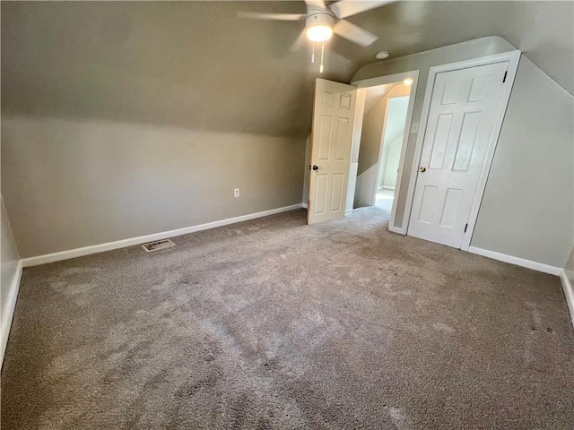 bonus room with baseboards, visible vents, carpet floors, lofted ceiling, and ceiling fan