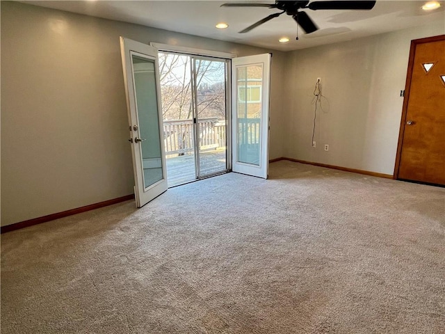 unfurnished room featuring recessed lighting, carpet flooring, a ceiling fan, and baseboards