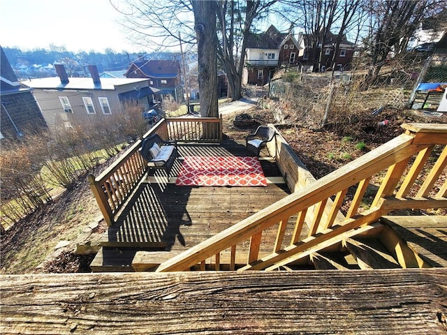 wooden deck with a residential view