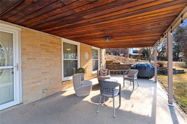 view of patio with a grill