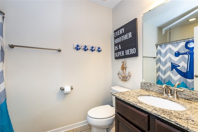 bathroom with a shower with curtain, toilet, tile patterned flooring, baseboards, and vanity