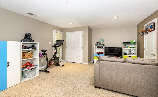 interior space featuring recessed lighting, visible vents, carpet flooring, and baseboards
