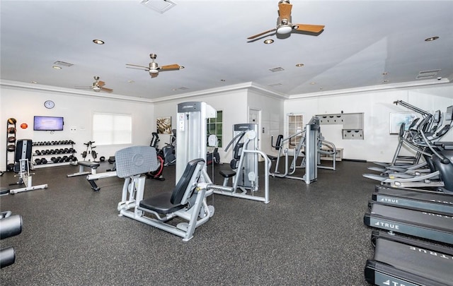 gym featuring visible vents, crown molding, ceiling fan, and vaulted ceiling