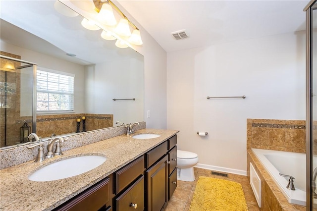 full bath with a garden tub, visible vents, and a sink