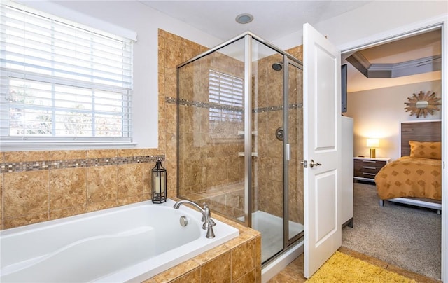ensuite bathroom with a bath, connected bathroom, crown molding, and a shower stall