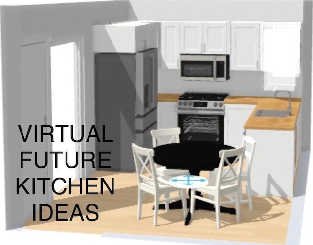 kitchen featuring a sink, stainless steel microwave, range with gas stovetop, and white cabinets