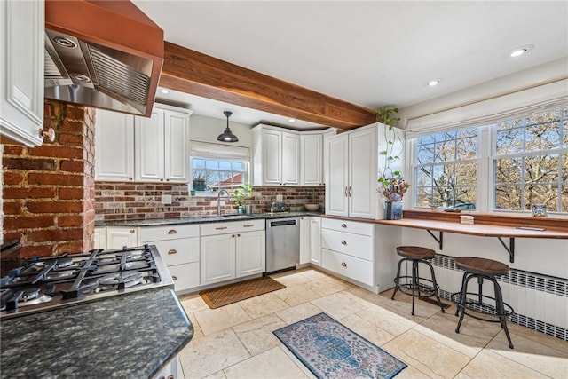 kitchen featuring range hood, white cabinetry, beam ceiling, a sink, and dishwasher