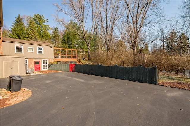 view of road featuring aphalt driveway