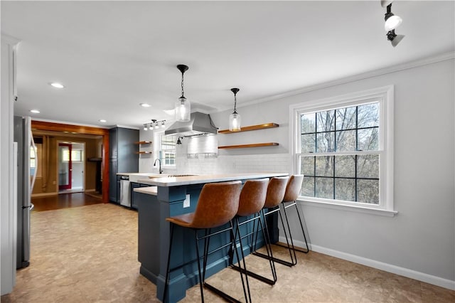 kitchen with tasteful backsplash, extractor fan, a breakfast bar area, light countertops, and open shelves