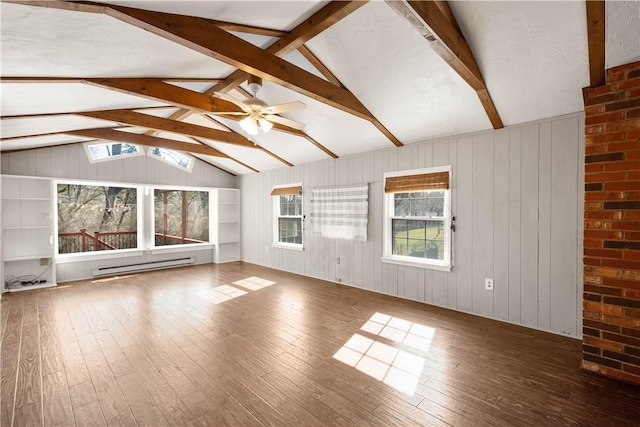 unfurnished living room featuring wood-type flooring, baseboard heating, ceiling fan, and vaulted ceiling with beams