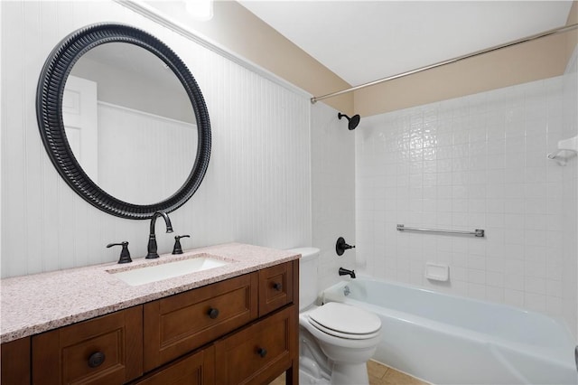 full bathroom featuring toilet, vanity, and bathtub / shower combination