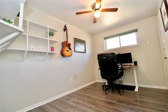 office featuring a ceiling fan, wood finished floors, and baseboards