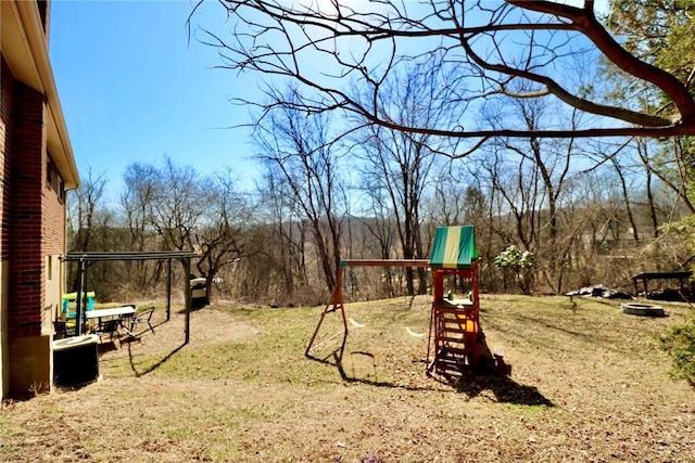 view of yard featuring a playground