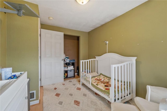 bedroom featuring visible vents