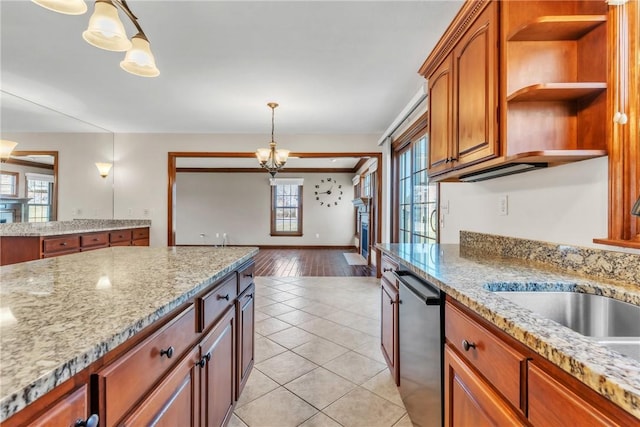 kitchen with brown cabinets, pendant lighting, open shelves, a sink, and black dishwasher