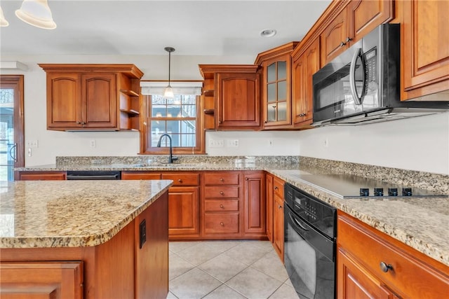 kitchen featuring a sink, brown cabinets, black appliances, and open shelves