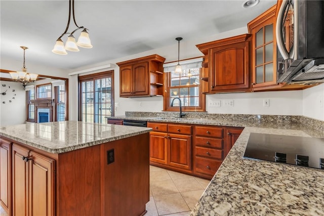 kitchen featuring an inviting chandelier, open shelves, a sink, black appliances, and a wealth of natural light