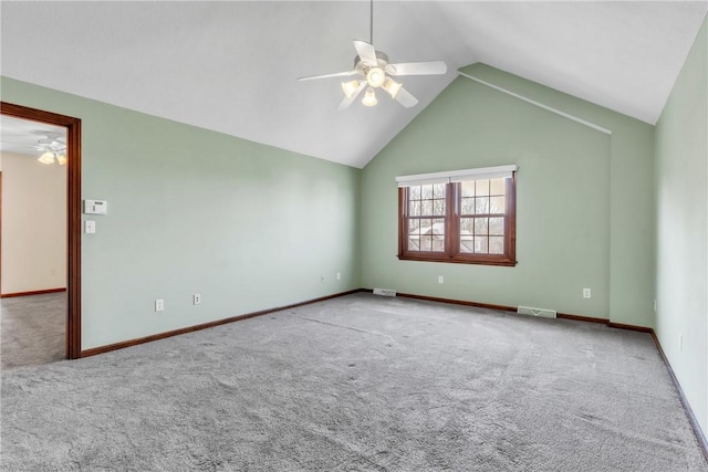 empty room featuring baseboards, carpet floors, and ceiling fan