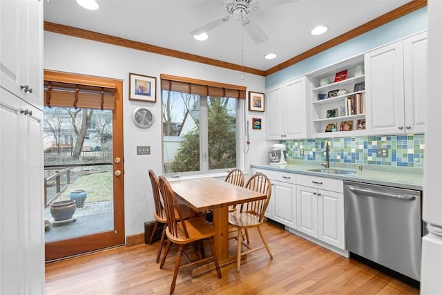 dining room with light wood finished floors, recessed lighting, a ceiling fan, and ornamental molding