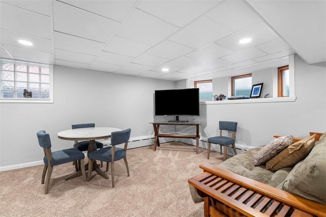 dining space featuring light carpet, recessed lighting, a healthy amount of sunlight, and baseboards