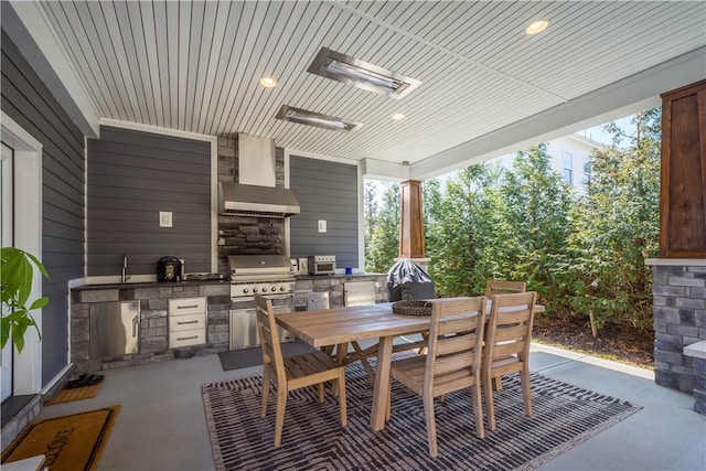 view of patio / terrace with area for grilling, outdoor dining area, and a grill