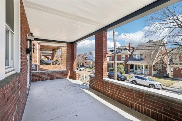 view of patio / terrace with a residential view