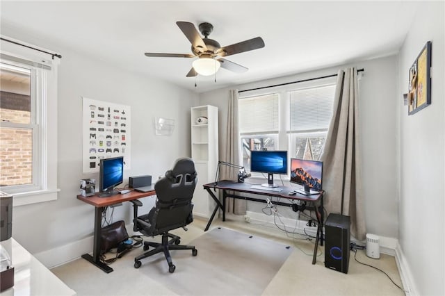 office with baseboards and a ceiling fan