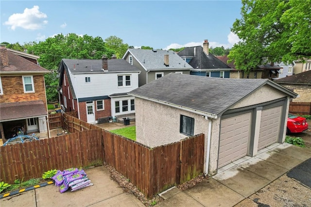 3234 Pinehurst Ave, Dormont, PA 15216 - rear view of house with roof with shingles, a residential view, and stucco siding