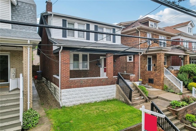 3234 Pinehurst Ave, Dormont, PA 15216 - view of front of home with brick siding, a chimney, and stairs