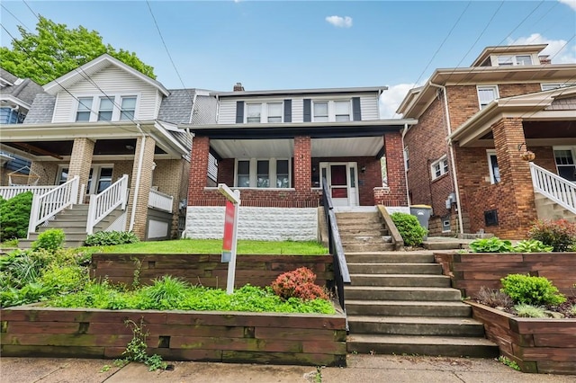 3234 Pinehurst Ave, Dormont, PA 15216 - view of front facade featuring stairs, brick siding, and covered porch