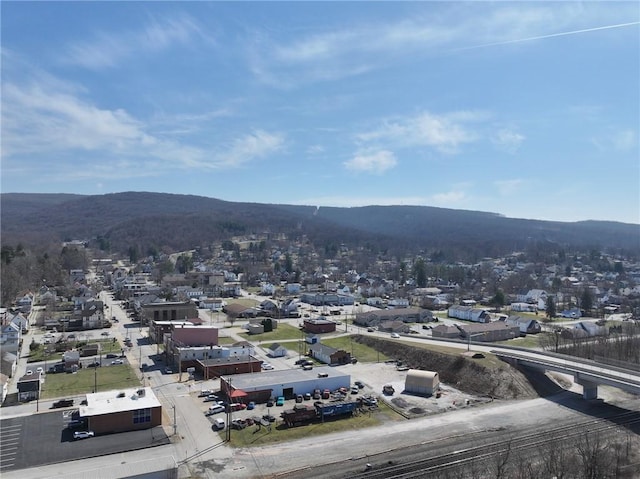 drone / aerial view featuring a mountain view