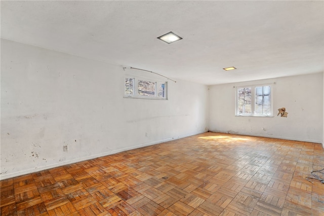 empty room with baseboards