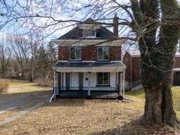 traditional style home with a porch