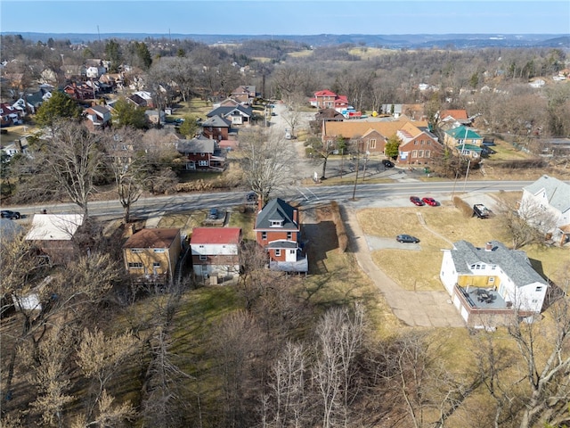 birds eye view of property with a residential view