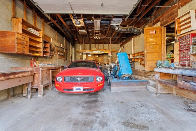 garage with a workshop area