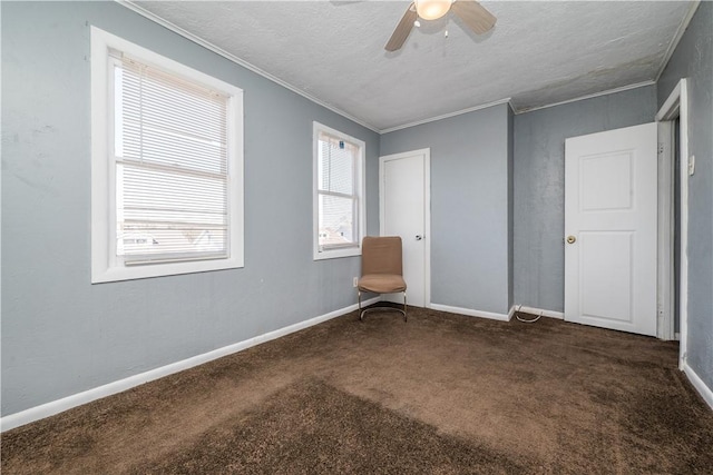 spare room with carpet flooring, baseboards, and ornamental molding