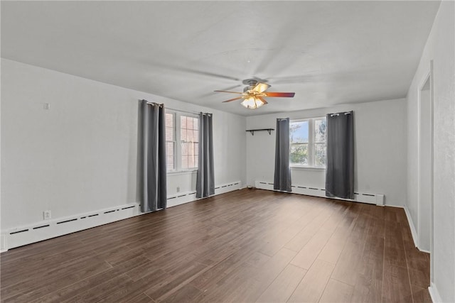 empty room with a baseboard radiator, dark wood-style flooring, and a ceiling fan