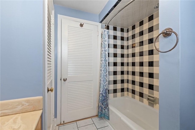 full bathroom with tile patterned floors and shower / tub combo with curtain