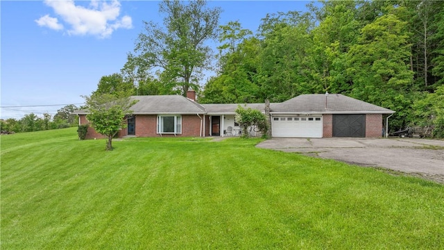 884 Linden Rd, North Strabane, PA 15330 - ranch-style house with an attached garage, driveway, a chimney, a front lawn, and brick siding