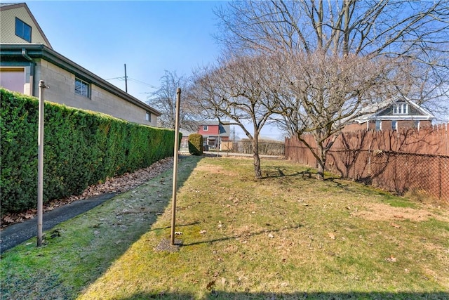 view of yard featuring fence